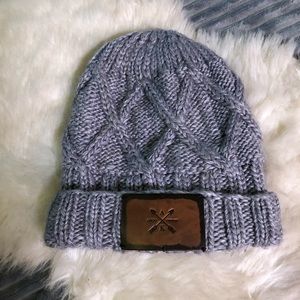 Gray, cable knit ALASKA CHICKS hat.